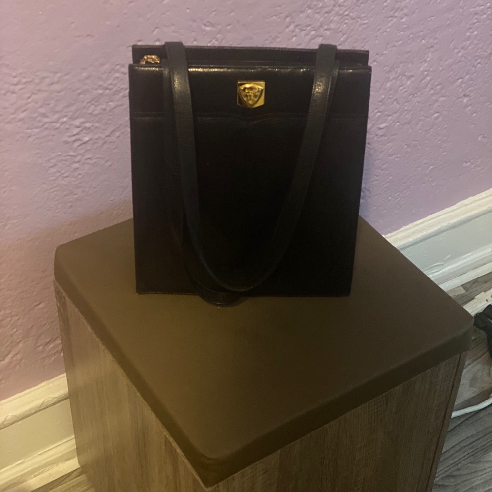 Gently used esquire collection bag